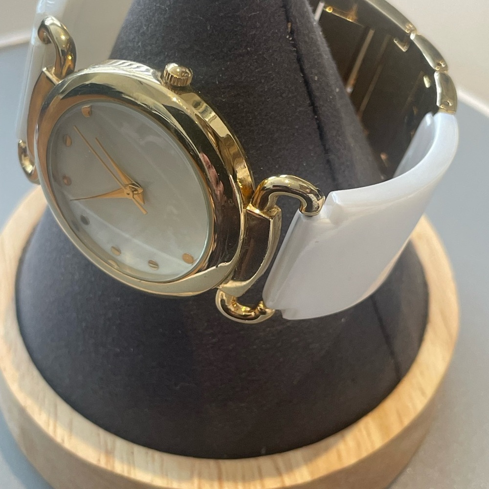 Elegant Gold and White Watch